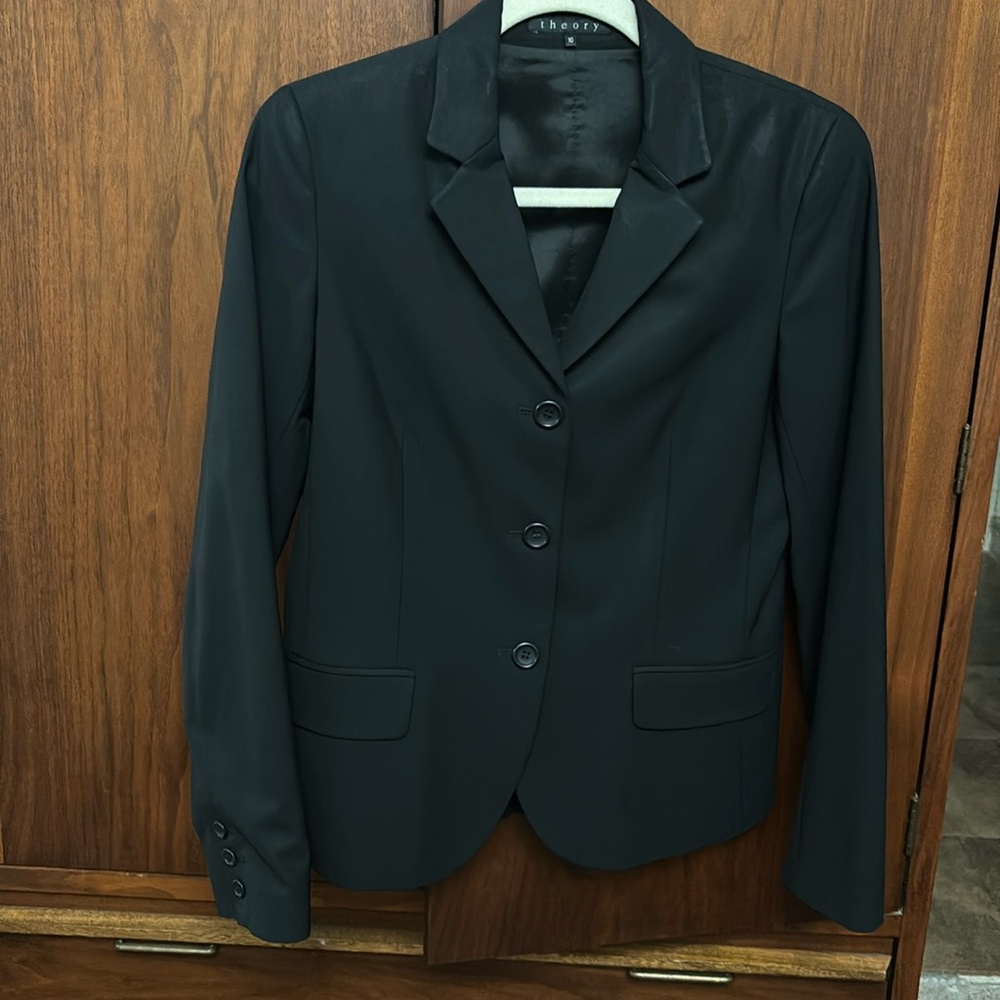Theory black blazer size 10. Dry clean only. 96% wool 4% Lycra.